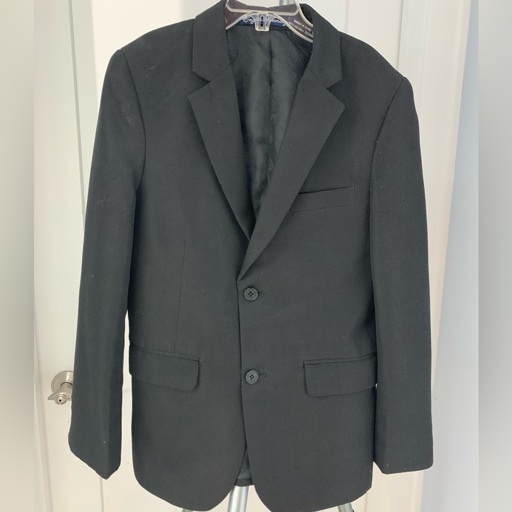 Navy Suit, matching coat and pant, lined with interior pockets, like new